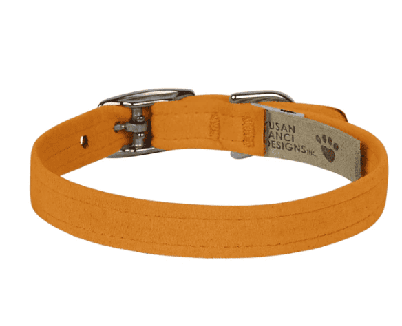 A dog collar made of orange fabric with metal buckle and hardware, designed for pet comfort and style, suitable for small to medium dogs. Perfect for fashionable pet accessories from Paws With Fashion.